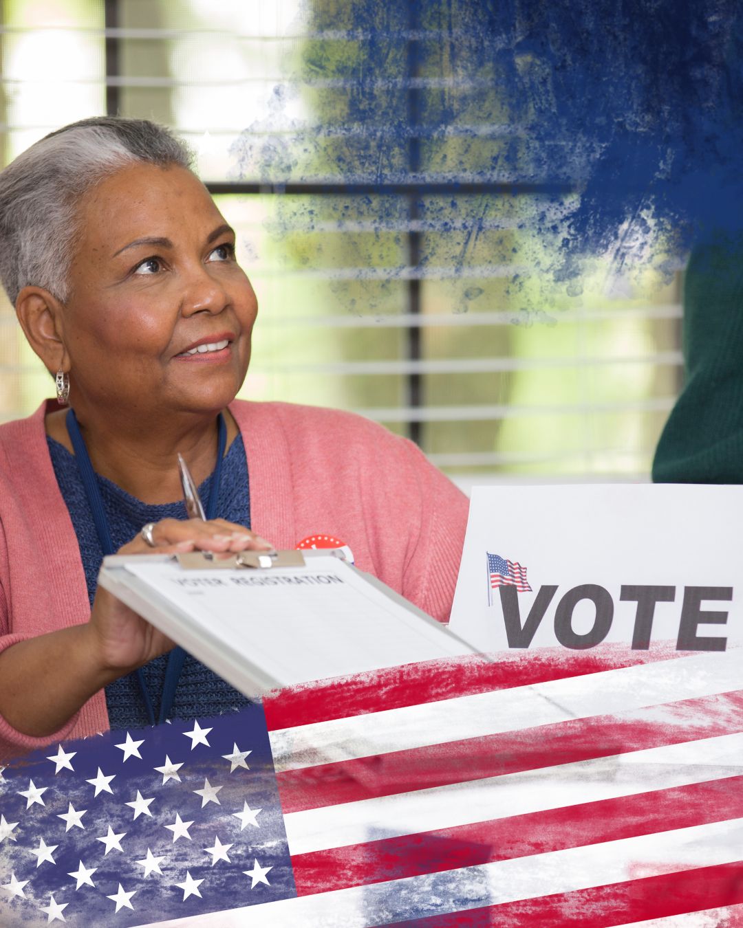 A woman helping someone register to vote.